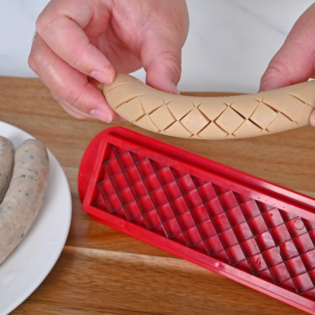 Feliator manual pentru hot-dog Cyrax, crestare carnati si hot-dog, manual, potrivit pentru gratar, 29.5 x 6.5 cm, din inox si ABS, rosu